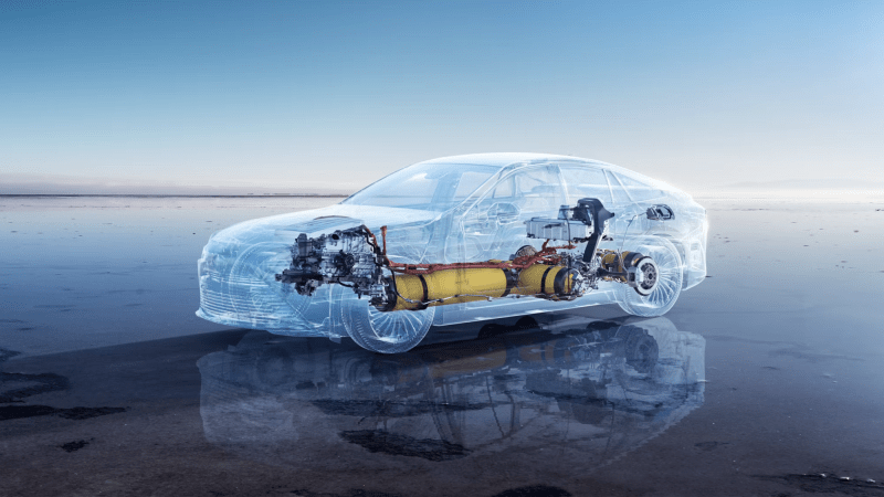 A graphic depicting the inner workings of a 2024 Toyota Mirai, showing the vehicle's hydrogen storage system, fuel cell, and electric motor.